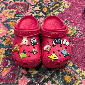 Pink Crocs (charms included but can be taken out)